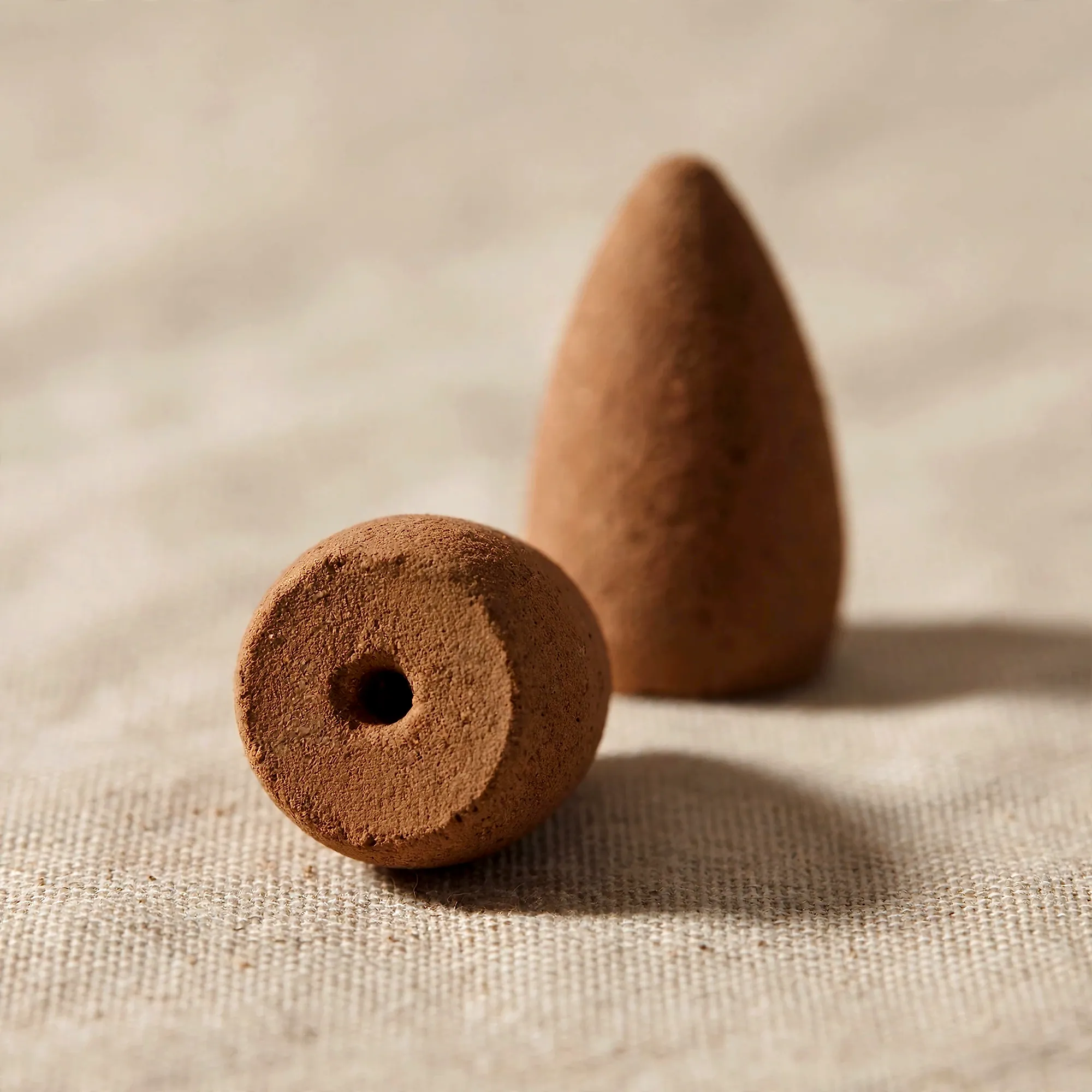 An upturned backflow cone showing the hollow channel in its base